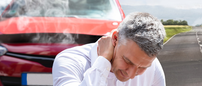 a man neck pain from an auto injury